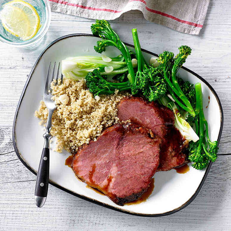 Soy and ginger glazed beef with garlic greens